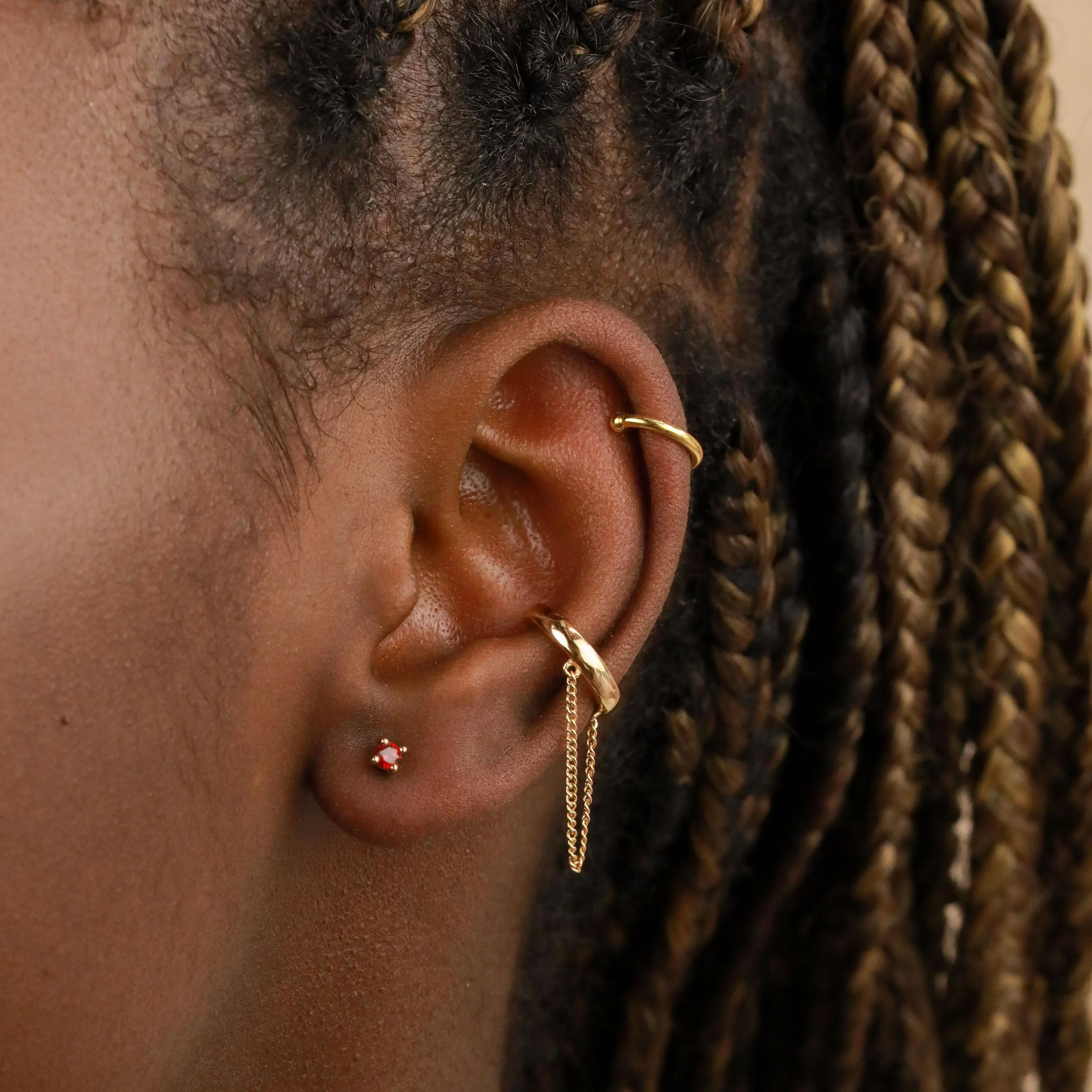 January Birthstone Stud Earrings in Gold with Garnet CZ - Image 4